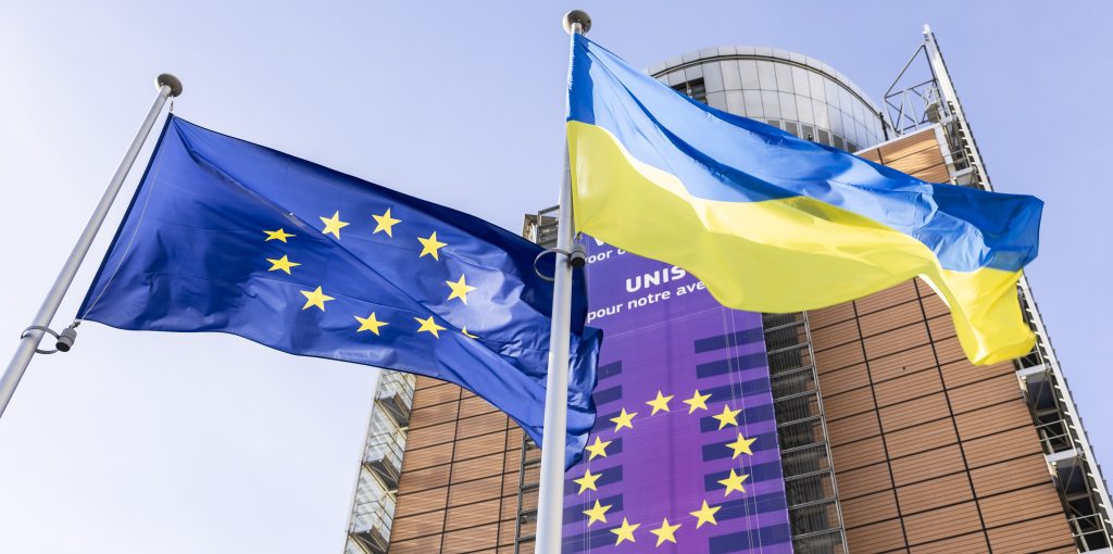 European and Ukrainian flags raised in front of the Berlaymont building to commemorate the third year of the Russian invasion of Ukraine